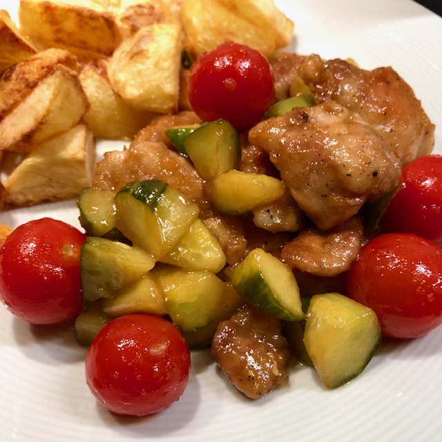 Stir fried chicken with cucumber and tomato - with oven roasted  potatoes
