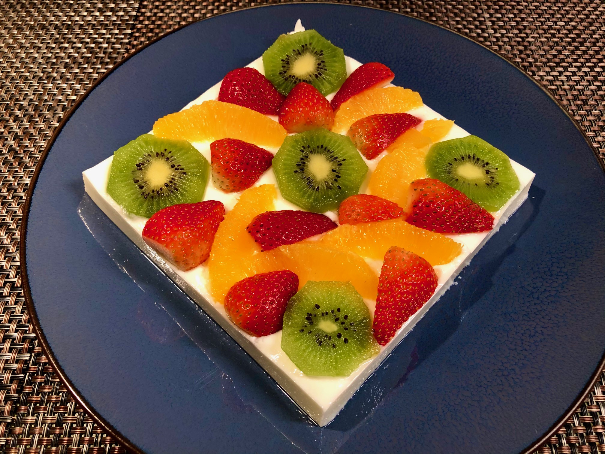 Fluffy yogurt jelly with fruits topping