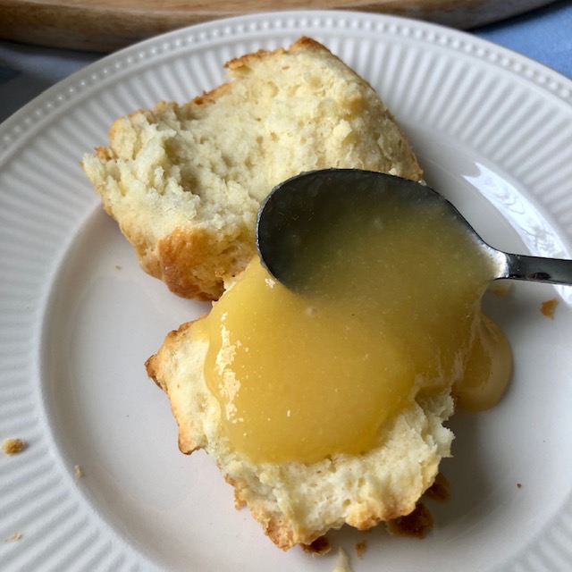 Delicious apple lemon curd with scone.