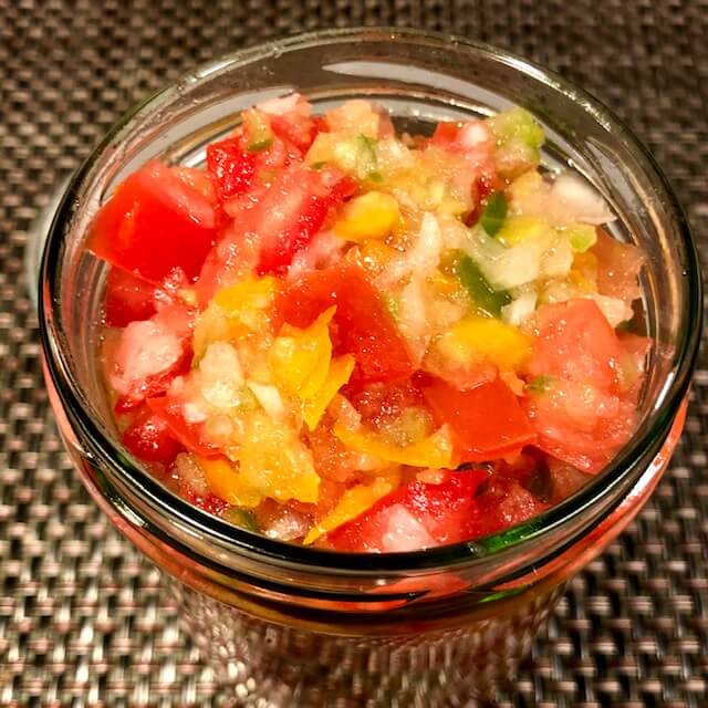 Chopped vegetable sauce in a jar