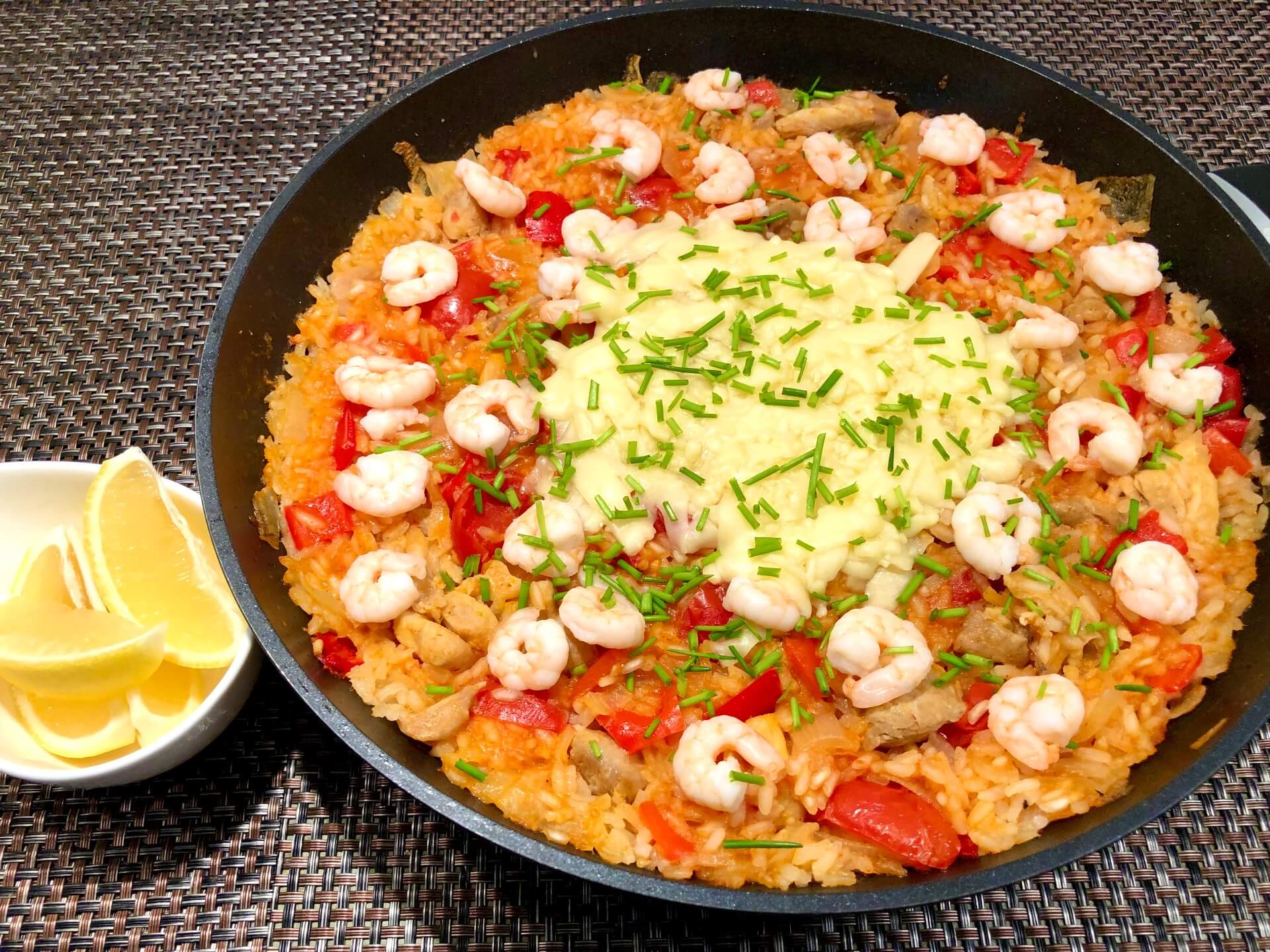 Cheese paella with chicken and shrimp